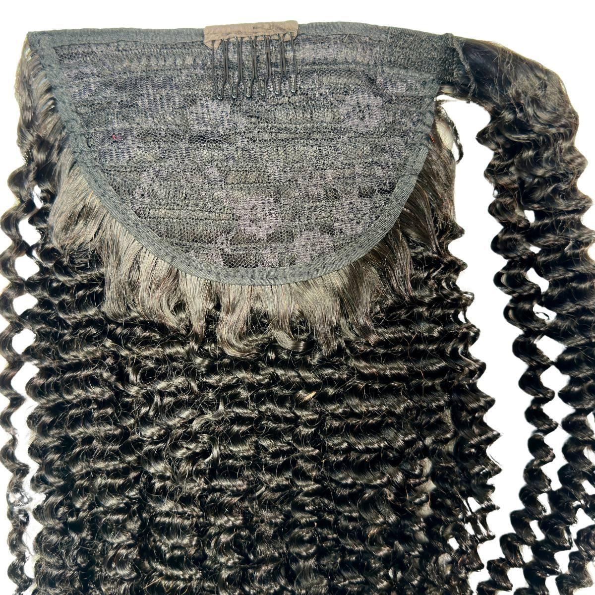 Jerry Curl Ponytail - Underside of jerry curl natural black 1B wrap ponytail showing mesh cap, comb clips and drawstring base