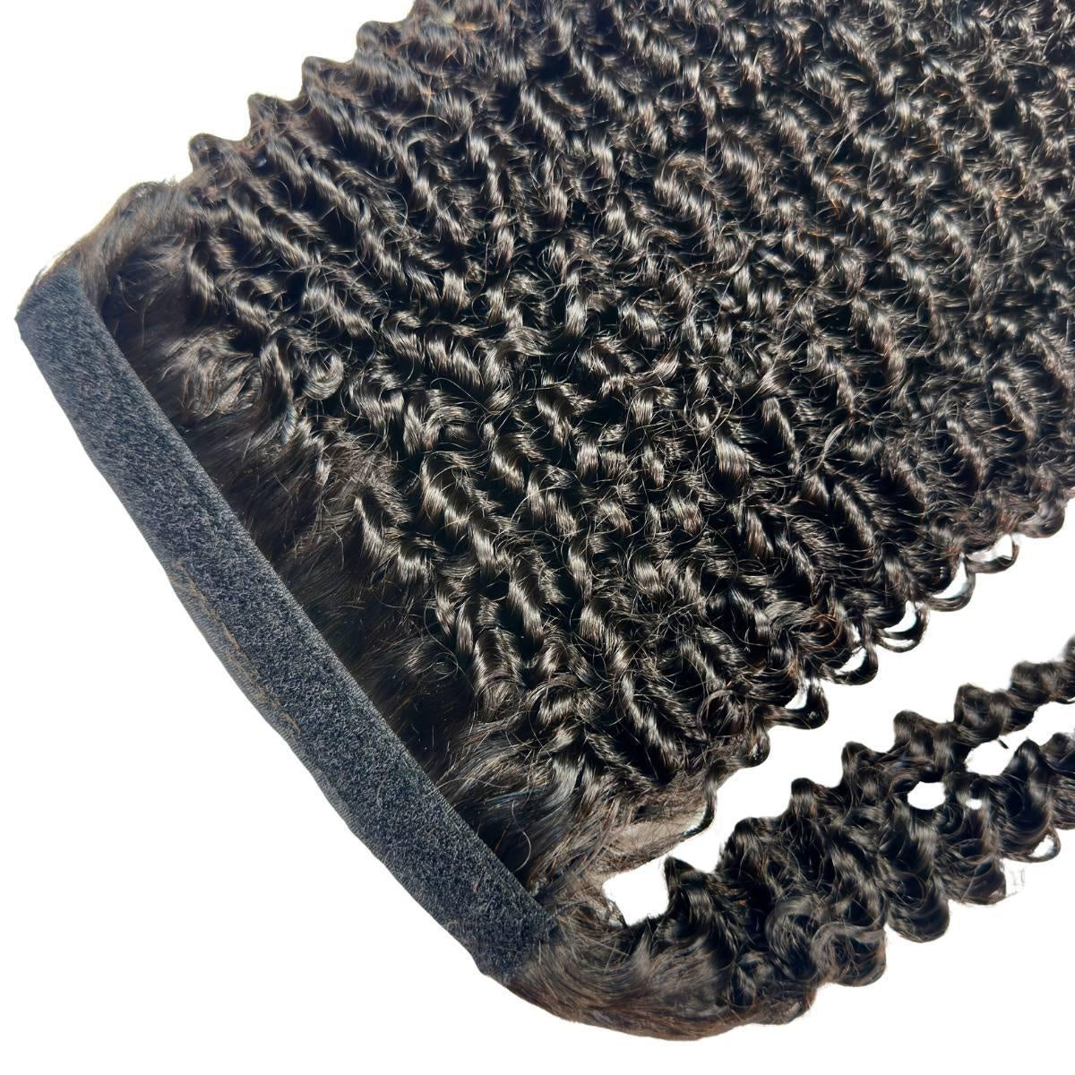 Jerry Curl Ponytail - Jerry curl natural black 1B ponytail attachment detail with black velcro wrap strap and spiral curls