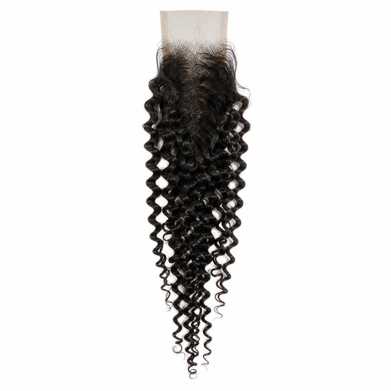 Natural black kinky curly HD lace closure hair extensions laid flat on white with the narrow lace panel above spiralling curls