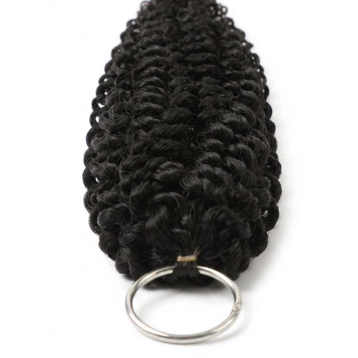 Close-up of the bound loop and metal ring on natural black kinky curly feather crochet hair extensions seen from the tip