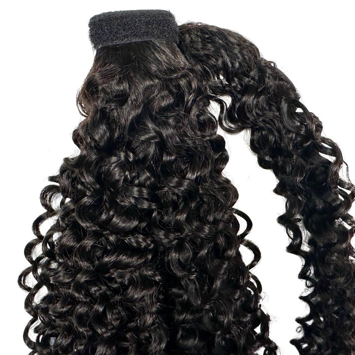Kinky Curly Ponytail - Natural black 1B kinky curly wrap-around ponytail showing hook-and-loop velcro attachment strap at the top