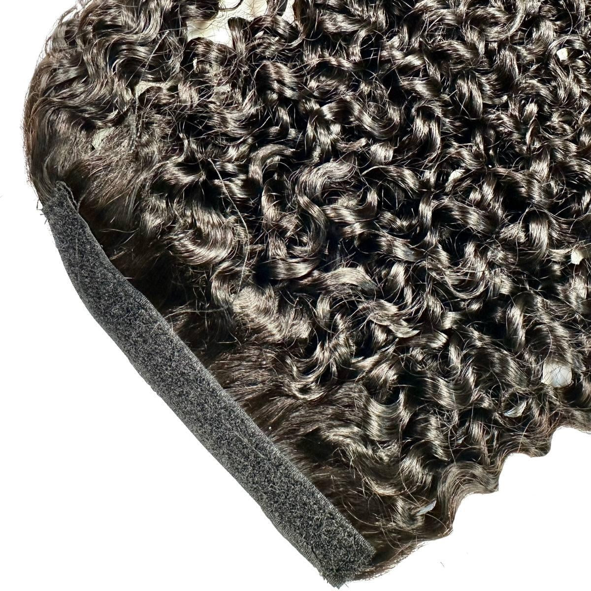 Kinky Curly Ponytail - Detail of natural black 1B kinky curly ponytail wrap strip with velcro closure and curl texture, product on white