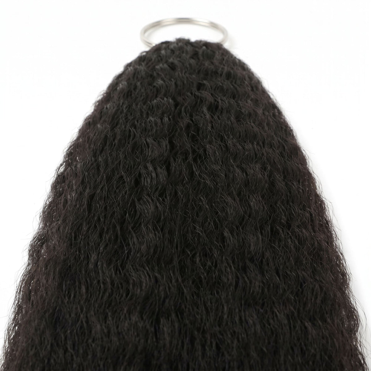 Close-up of the looped end and metal ring on natural black kinky straight feather crochet hair extensions