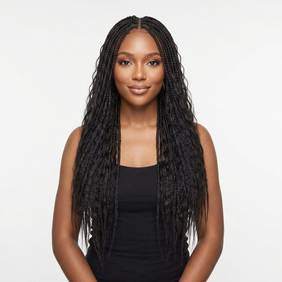 Model wearing natural black kinky straight feather crochet hair extensions in boho braids with loose textured ends on a white background