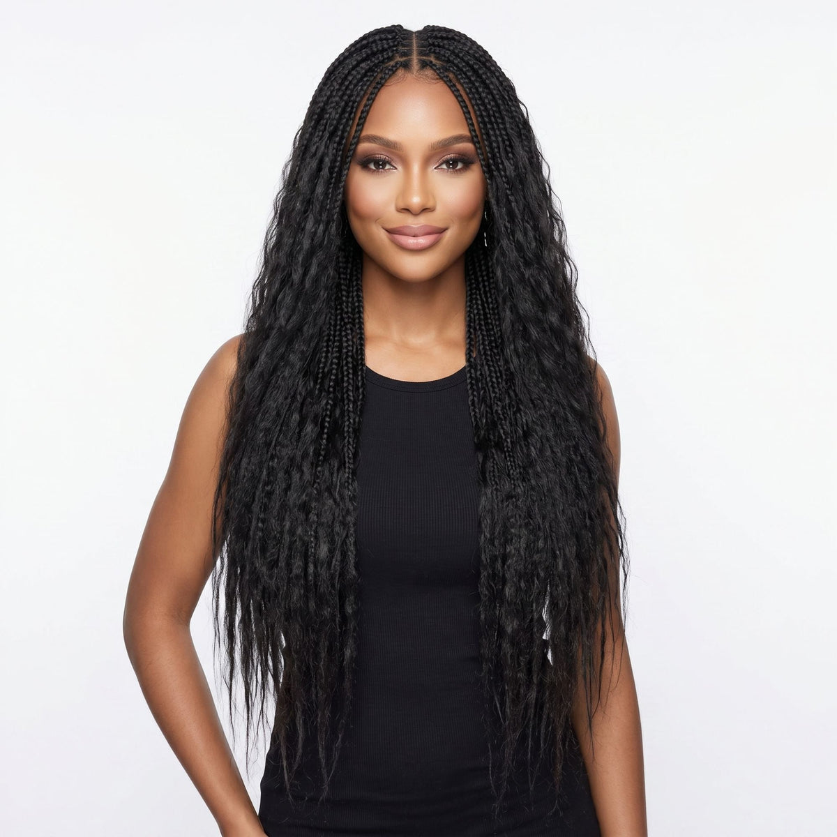 Model wearing natural black kinky straight feather crochet hair extensions in long boho braids with loose crimped ends on a white background