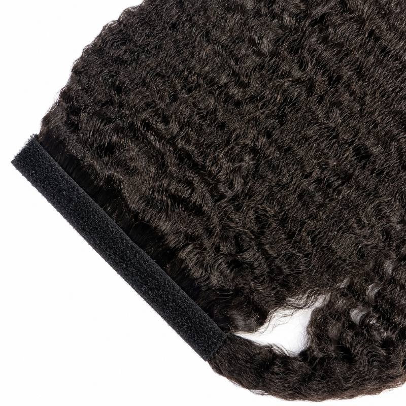 Close-up of the hook and loop strip stitched along the top edge of natural black kinky straight ponytail hair extensions