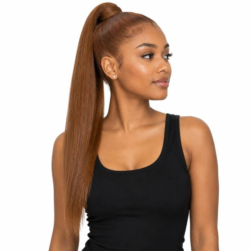 Model wearing a sleek high ponytail in auburn straight hair extensions, head turned to show the wrapped base and smooth length