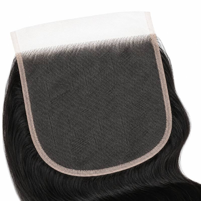 Detail of the lace base and stitched border on natural black body wave lace closure hair extensions