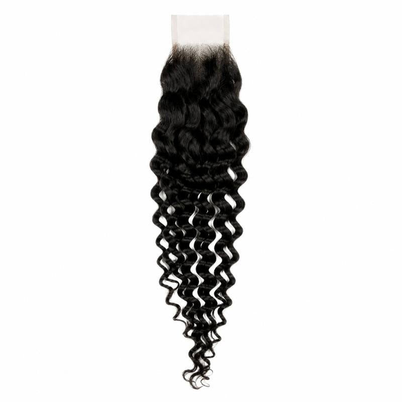 Natural black spiral wave lace closure hair extensions hanging in full with the narrow lace strip at the top and defined curls to the tips
