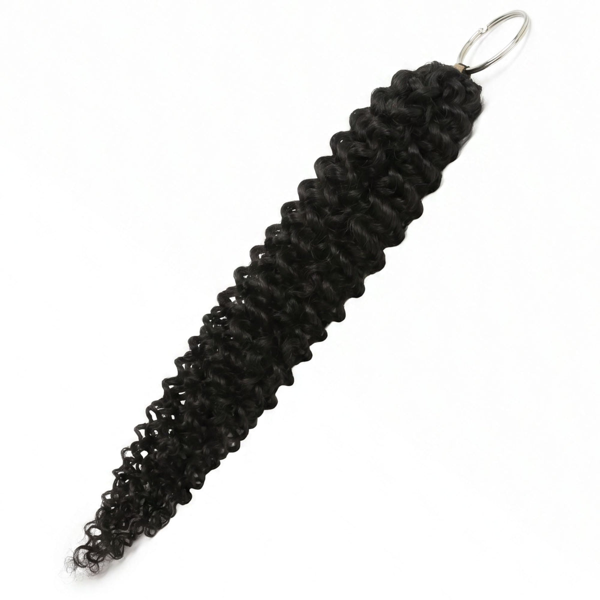 Natural black water wave crochet hair extensions laid out with the ring at the bound end and the curls tapering to fine tips