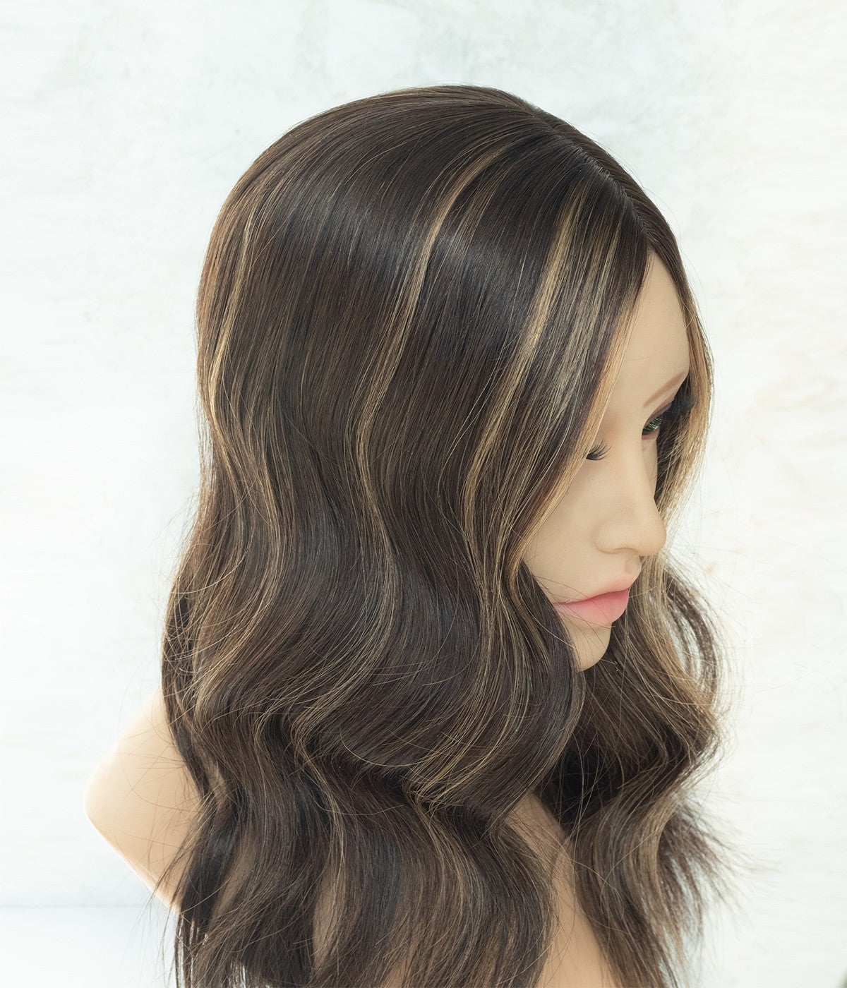 Human Hair Topper - Mono Top with Weft Back 7x8 - Dark Caramel (#224R) with highlights on mannequin, side view