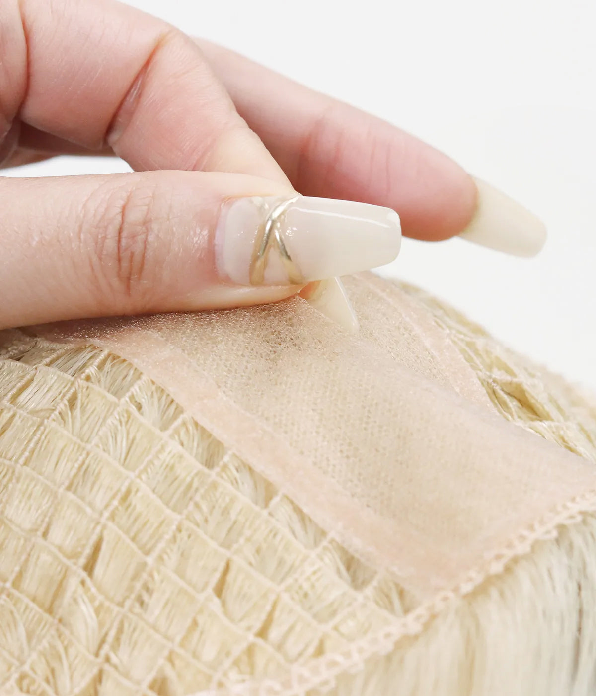 Human Hair Topper - Silk Part with Microline 6x6.5 - close-up of silk part panel and breathable cap base