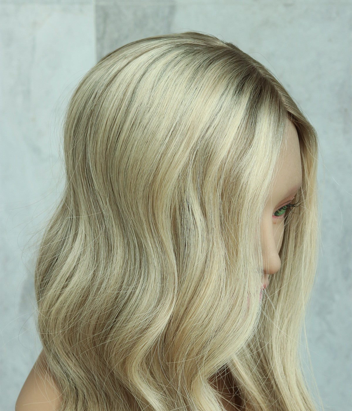 Human Hair Topper - Silk Top with Weft Back 6x6 - close-up of wavy blonde hair texture