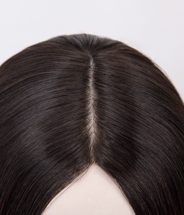 Human Hair Topper - Silk Top with Weft Back 6x6 - close-up of natural silk top center part in dark brown hair