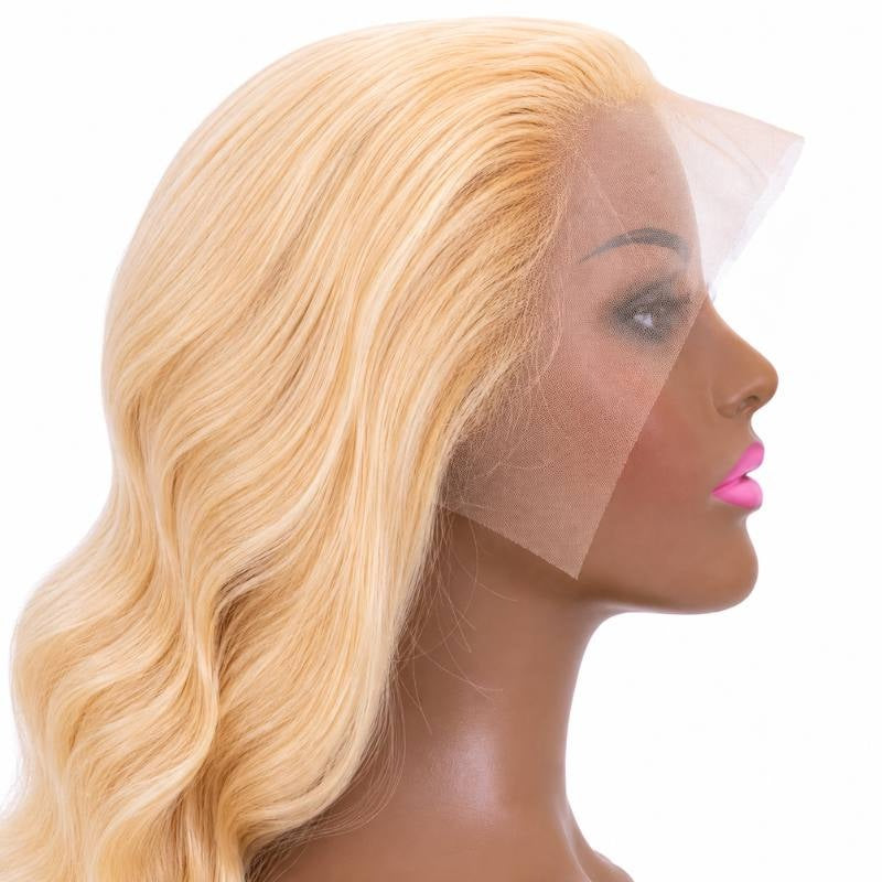Blonde body wave human hair wig in profile on a mannequin with the wide transparent lace panel hanging uncut over the face