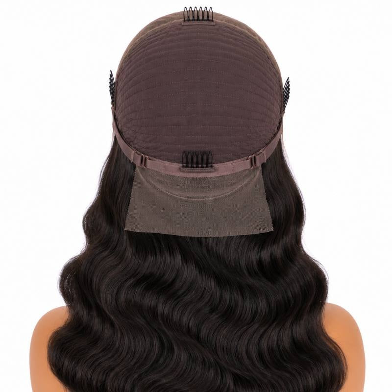 Inside back of the cap on a body wave natural black human hair wig showing four combs, the adjustable strap and the mesh nape panel