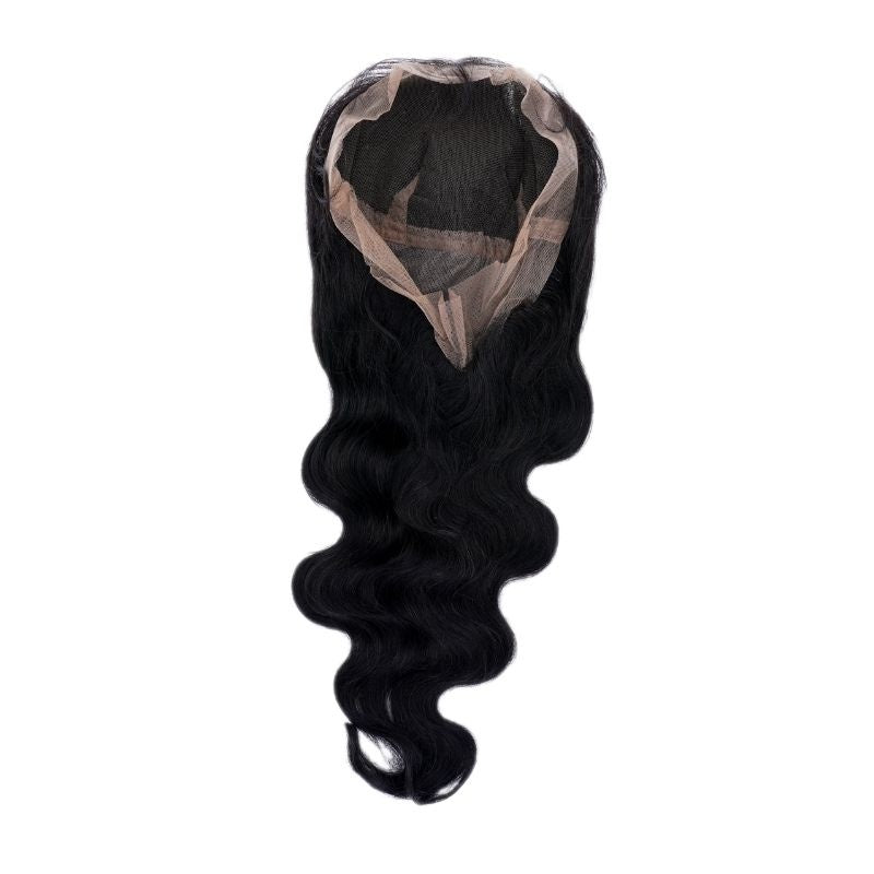 Body wave natural black human hair wig laid flat on white showing the full transparent lace cap and the waved length hanging below