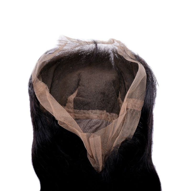Open cap of a body wave natural black human hair wig showing the full transparent lace interior and an adjustable strap at the nape
