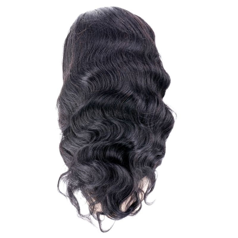 Back of a body wave natural black human hair wig laid flat on white showing the crown and the wave pattern running to the ends