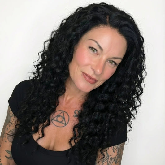 Human Hair Wig - Deep Wave 13x4 HD Lace Front Wig - Natural Black (1B) - model wearing front view portrait