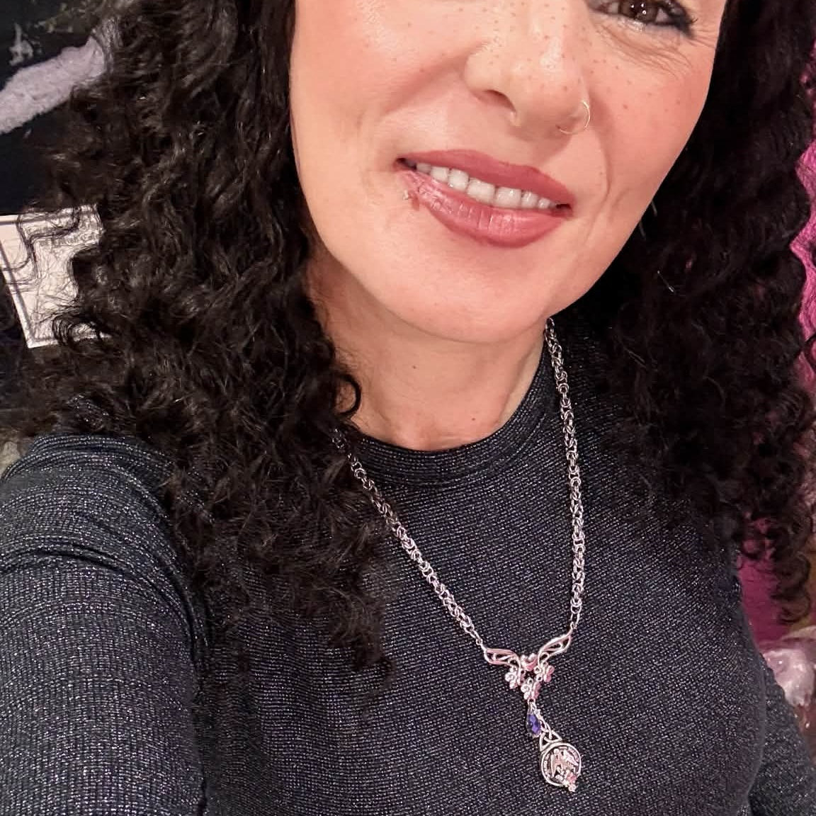 Selfie wearing 22 inch deep wave 13x4 HD lace front human hair wig showing face-framing curls and natural styling