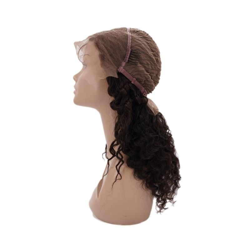 Side view of a natural black deep wave human hair wig on a mannequin showing the cap, a comb and the adjustable strap at the back