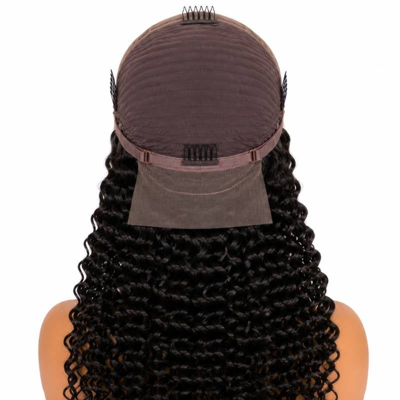 Back of the cap on a natural black deep wave human hair wig showing three combs and the adjustable strap above the waves
