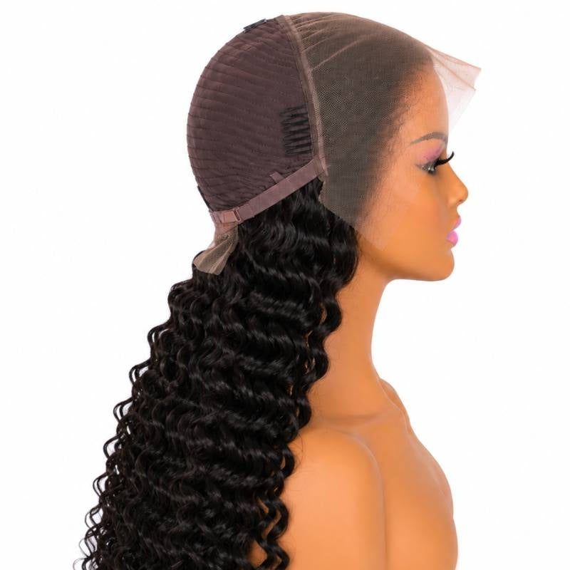 Natural black deep wave human hair wig turned back on a mannequin so the cap, a comb, the adjustable strap and the lace panel are visible