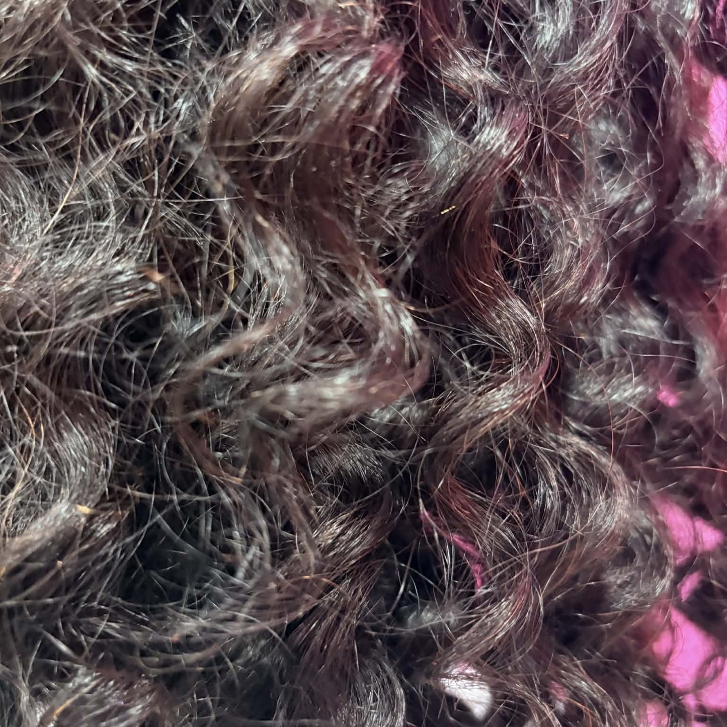 Macro close-up of deep wave hair texture on 14 inch headband human hair wig showing curl definition and volume