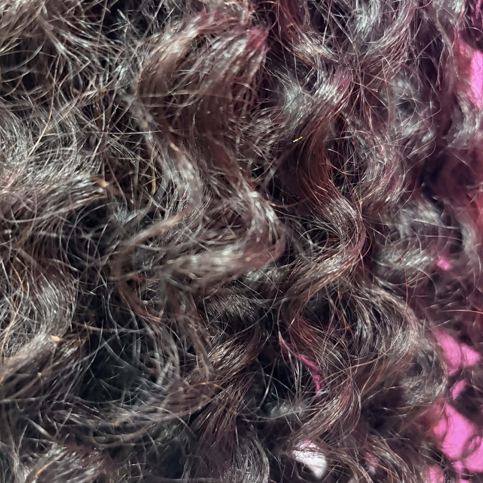 Macro close-up of deep wave hair texture on 14 inch headband human hair wig showing curl definition and volume