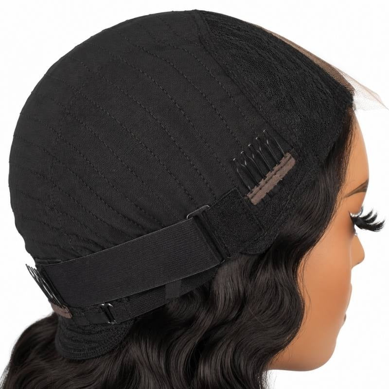 Cap of a natural black body wave human hair wig turned back on a mannequin showing the stitched dome, a comb and the elastic band