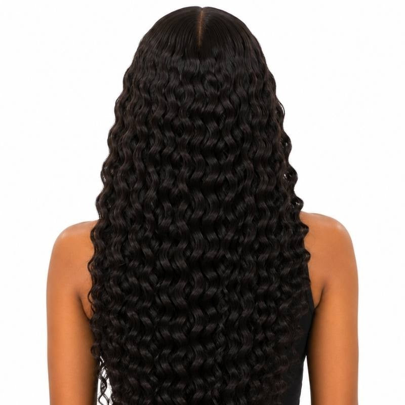 Back view of a model wearing a natural black deep wave human hair wig with the crimped waves reaching the lower back