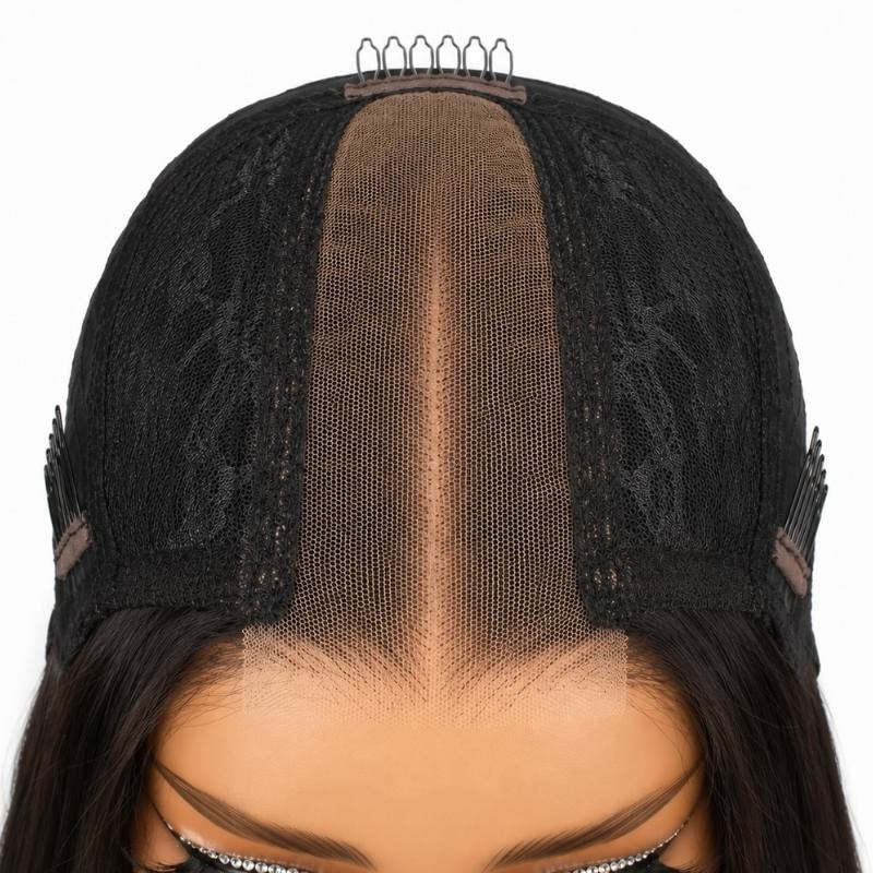 Top down view of the cap on a natural black straight human hair wig showing the narrow lace closure strip and the combs on the cap