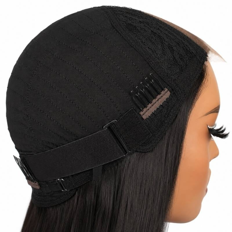 Cap of a natural black straight human hair wig folded back on a mannequin showing a comb, the elastic band and the lace at the front