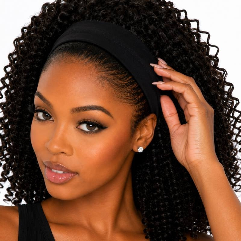 Close-up of the black headband on a natural black kinky curly human hair wig with the model's own edges brushed in front