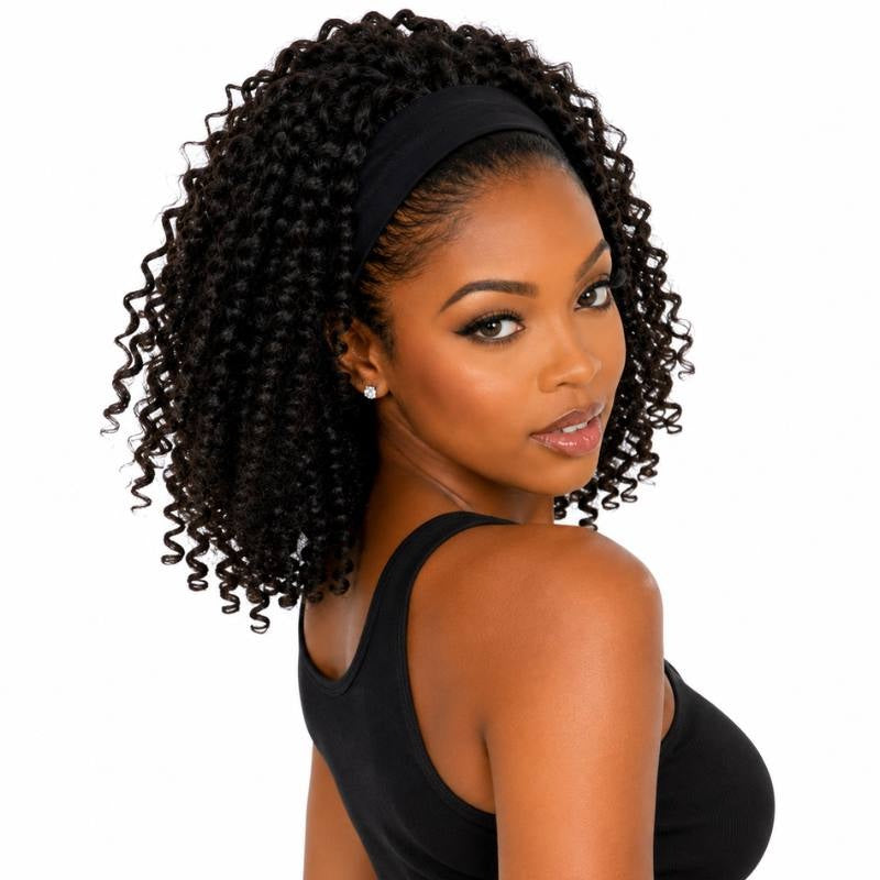 Model turned over the shoulder wearing a natural black kinky curly human hair wig with the headband in place and coils to the shoulders
