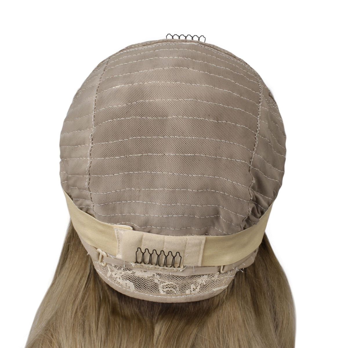 Back of a body wave human hair wig cap showing the adjustable strap with hook fastening, a nape comb and blonde hair below