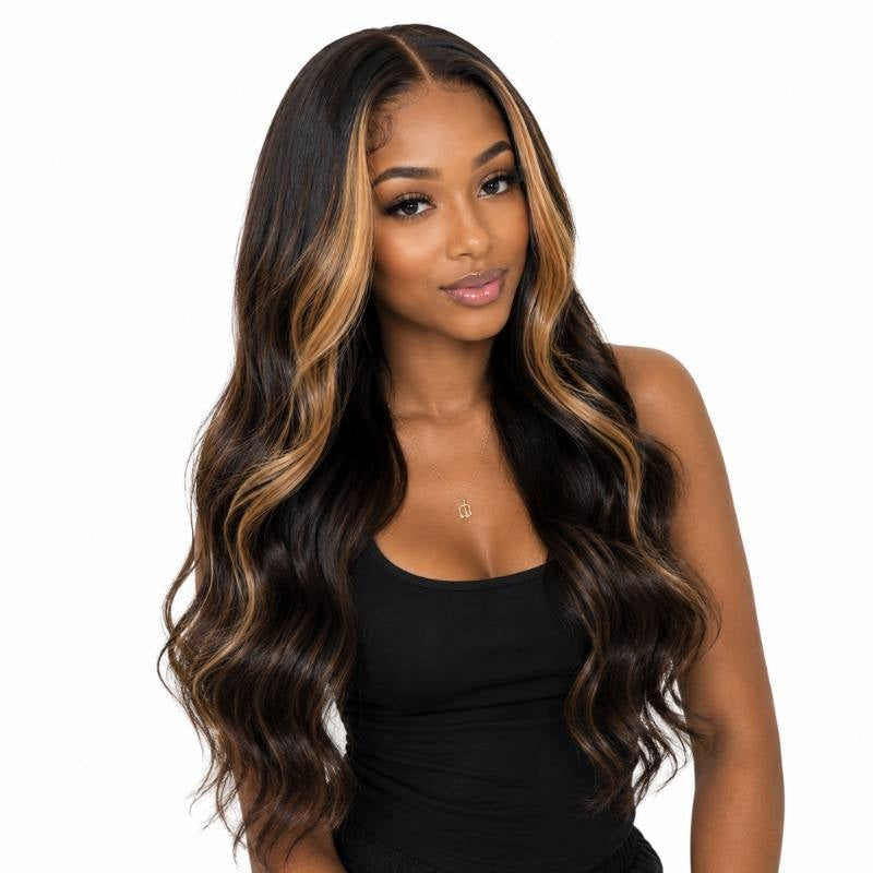 Model wearing a natural black body wave human hair wig with chocolate brown and toffee balayage streaks running through long waves