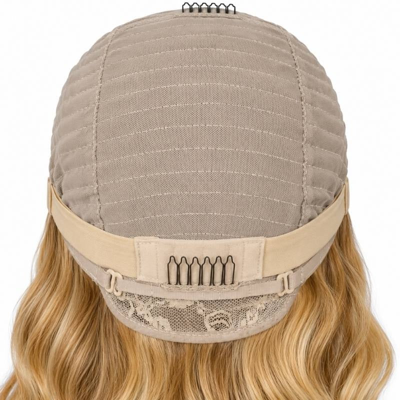 Back of a blonde body wave human hair wig cap showing the elastic band, adjustable buckles and a comb at the nape above blonde waves