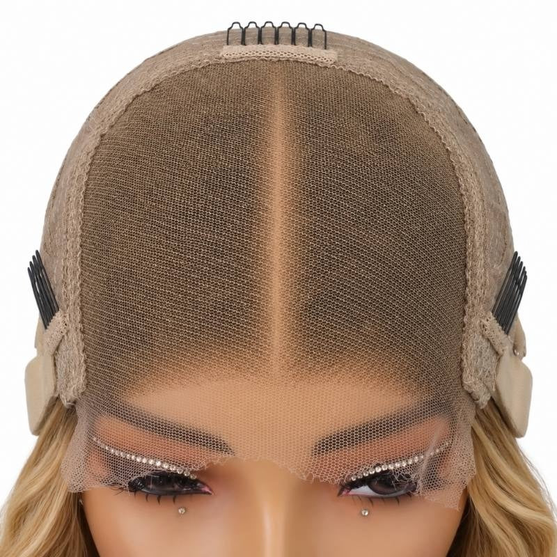 Front of a blonde body wave human hair wig cap on a mannequin showing the closure panel with a centre parting, combs at the temples and lace at the hairline