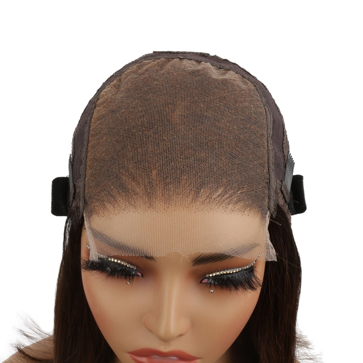 Interior front of the cap on a toffee and honey blonde balayage straight bob human hair wig showing the brown lace panel and adjustable tabs at the temples