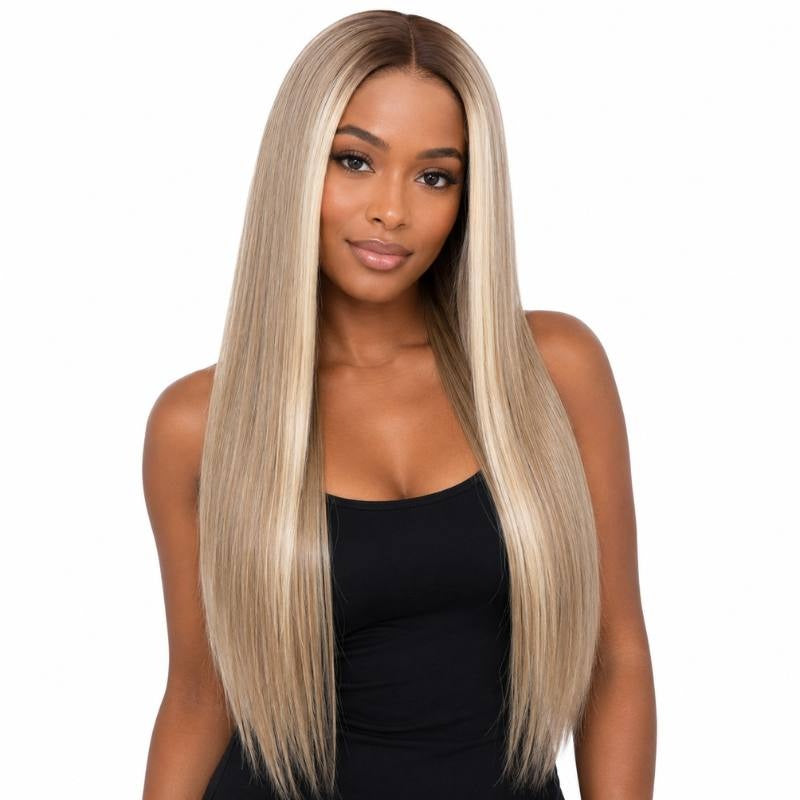 Model wearing a chocolate brown to ash blonde ombre straight human hair wig with a middle part and long straight lengths
