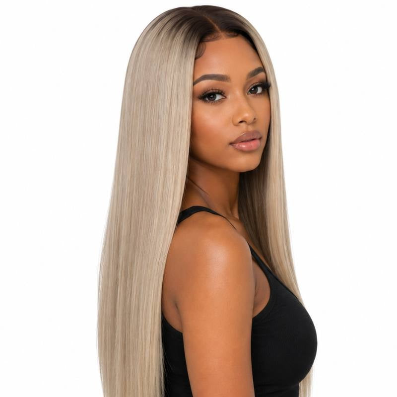 Chocolate brown rooted platinum blonde straight human hair wig on a model turned over the shoulder showing the long straight lengths