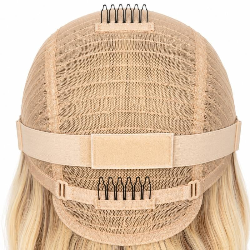 Interior back of the cap on a toffee and blonde balayage straight human hair wig showing the mesh dome, elastic band and combs at the nape and crown