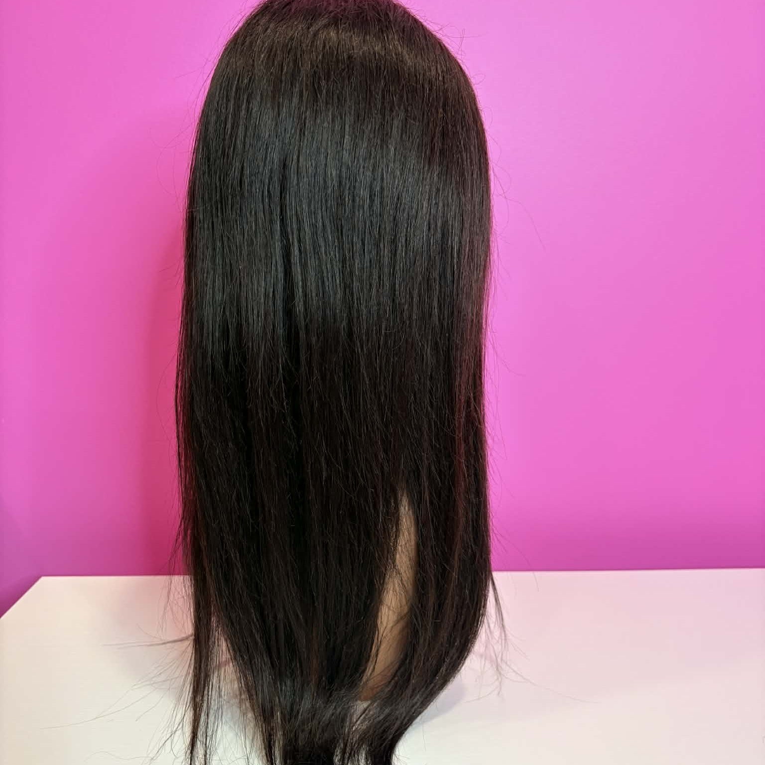 Back view of 20 inch straight 13x4 HD lace front human hair wig on mannequin showing sleek straight hair length