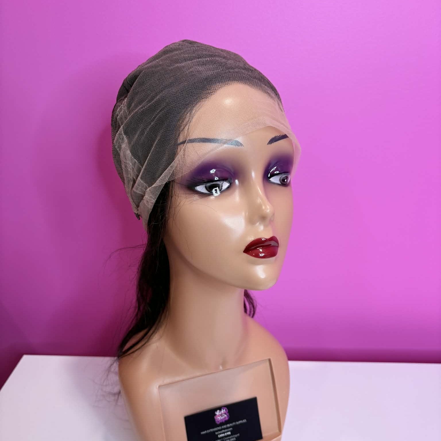 Interior front cap view of 20 inch straight human hair wig showing 13x4 HD lace frontal area and cap structure