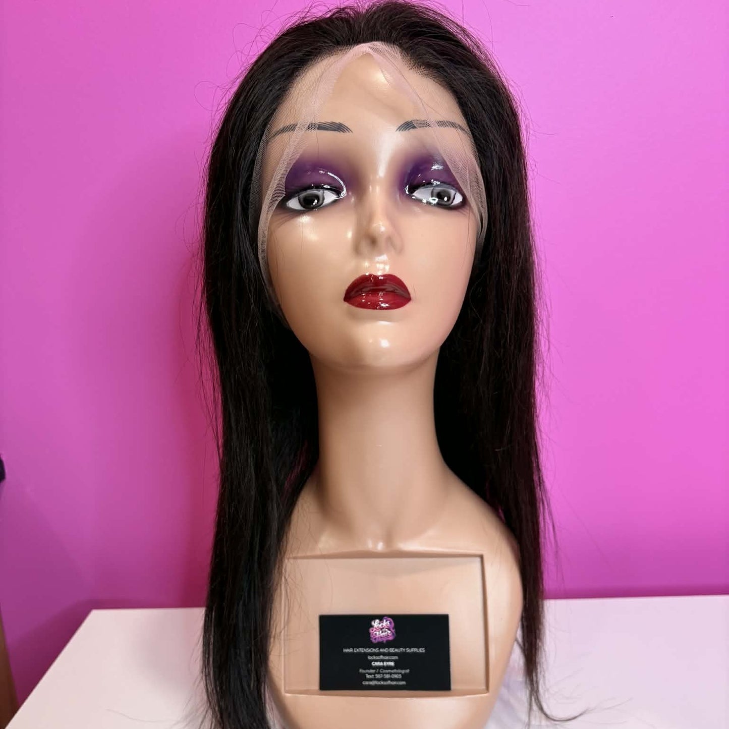 Front alternate view of 20 inch straight lace front human hair wig on mannequin showing lace frontal blend