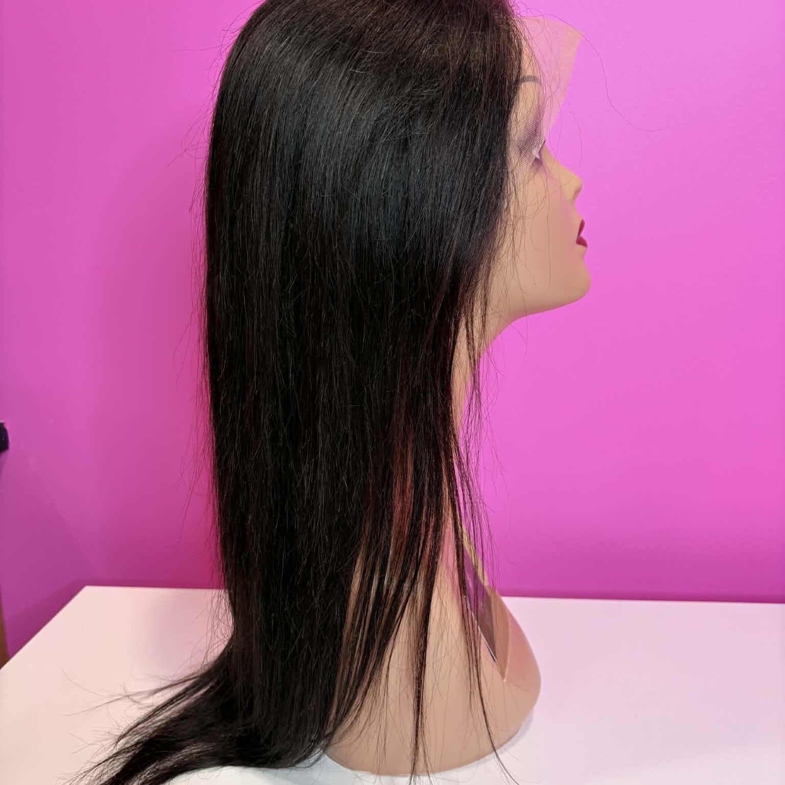 Right side profile of 20 inch straight lace front human hair wig on mannequin showing sleek straight flow and volume