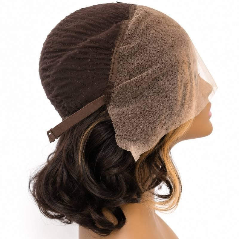 Cap of a dark brown and honey blonde balayage bob human hair wig on a mannequin seen from the side with the lace front laid over the face