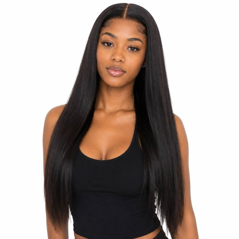 Model wearing a natural black straight human hair wig with a middle part and long straight lengths on a white background